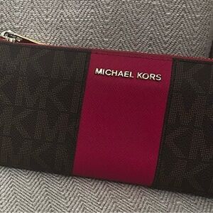 Michael Kors billfolds- sold separately- barely used condition